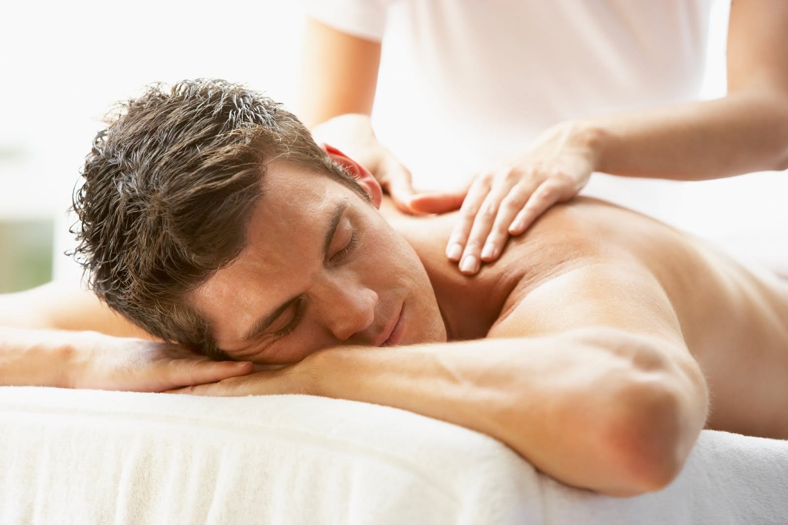 Image of a man during massage session